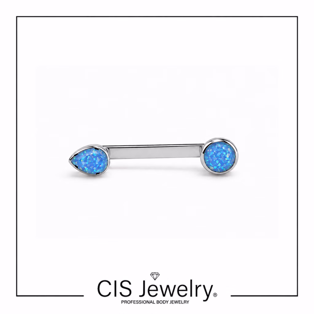 Piercing Surface con top gota engarsada y disco de ópalos azules