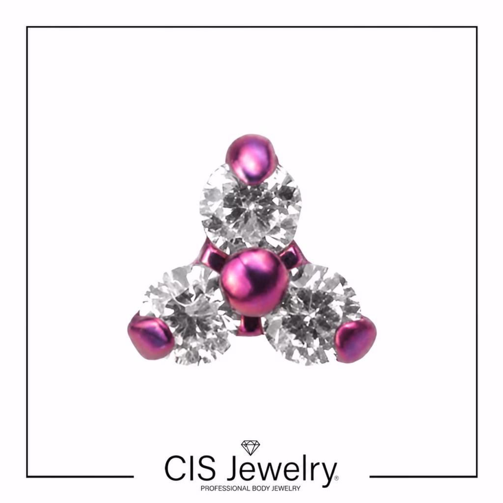 Piercing Labret y triniti mini zirconias anodizado fucsia