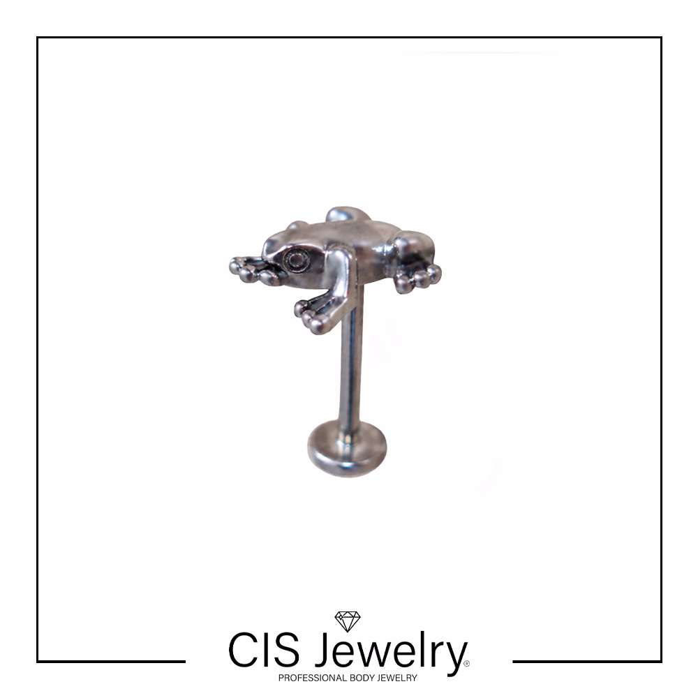 Piercing Labret con top ranita de la suerte